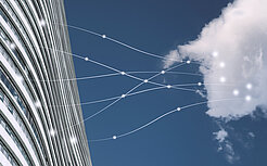 886684958 symbolische Verbindungslinien von Bürogebäude zur Cloud